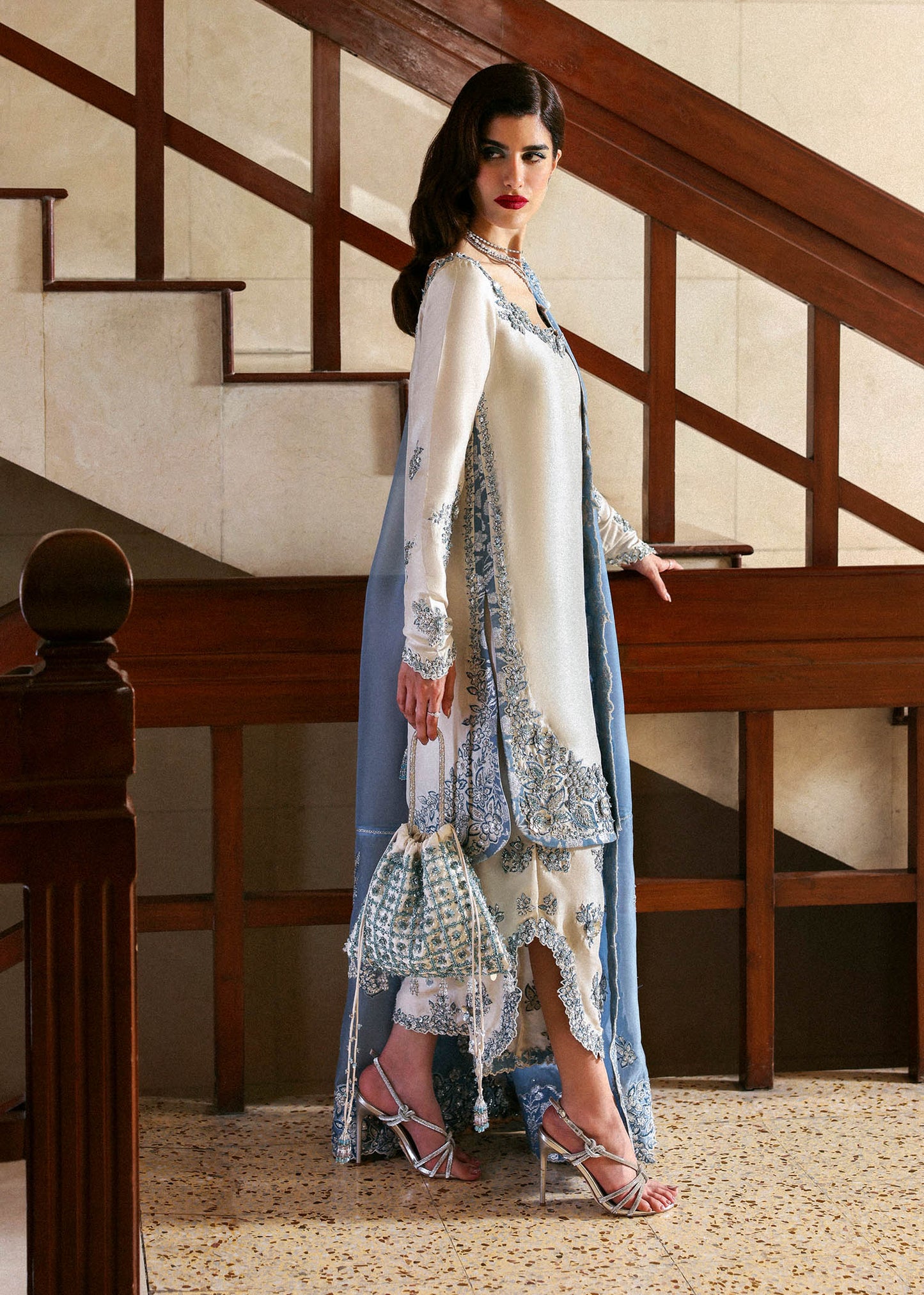 Model wearing off-white and blue Virelle dress by Hussain Rehar, Pakistani luxury pret available online in UK for occasions