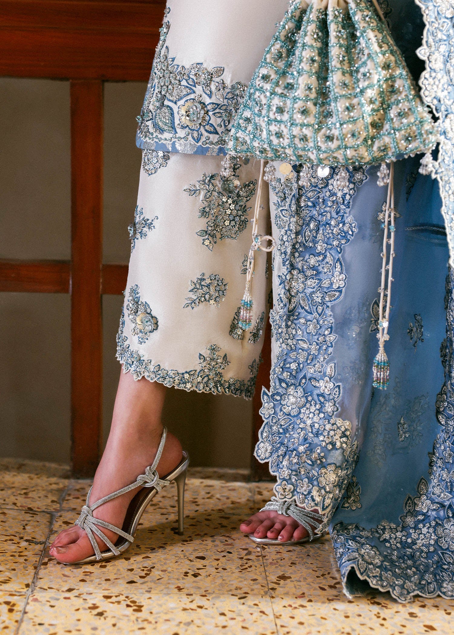 Model wearing off-white and blue Virelle dress by Hussain Rehar, Pakistani luxury pret available online in UK for occasions