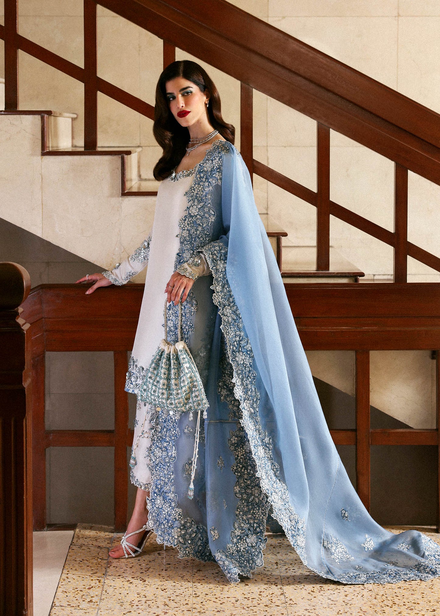 Model wearing off-white and blue Virelle dress by Hussain Rehar, Pakistani luxury pret available online in UK for occasions