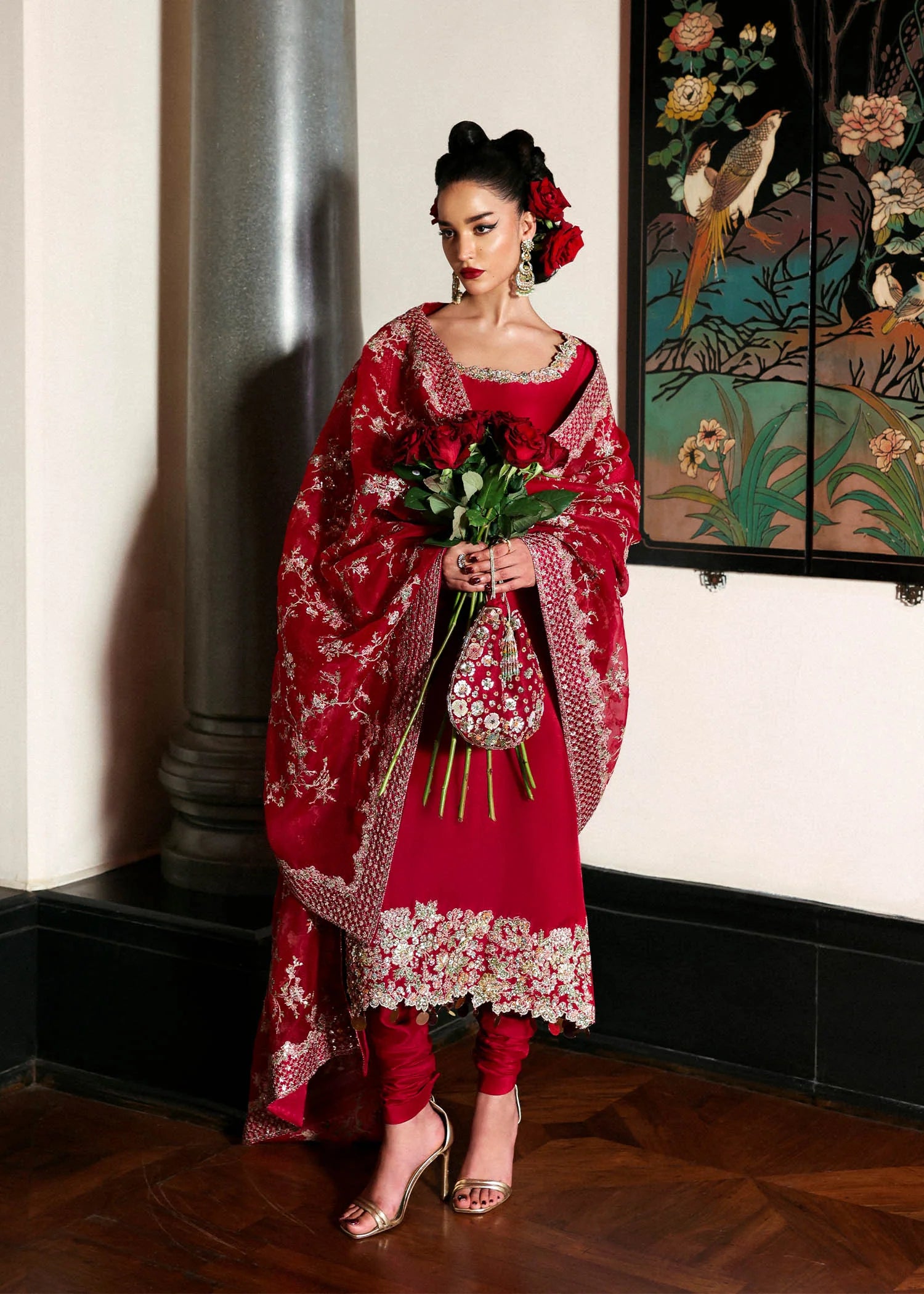 Model wearing deep red Zephira dress by Hussain Rehar, Pakistani luxury pret available online in UK for festive occasions