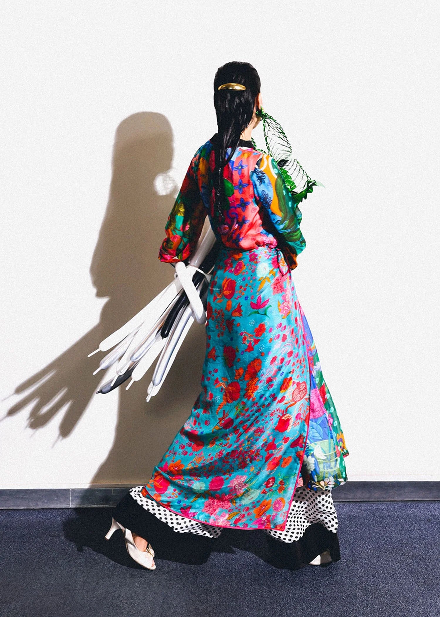 Model wearing multicolor floral Claret outfit with polka dot trousers from Hussain Rehar, ideal for Pakistani luxury pret in UK.