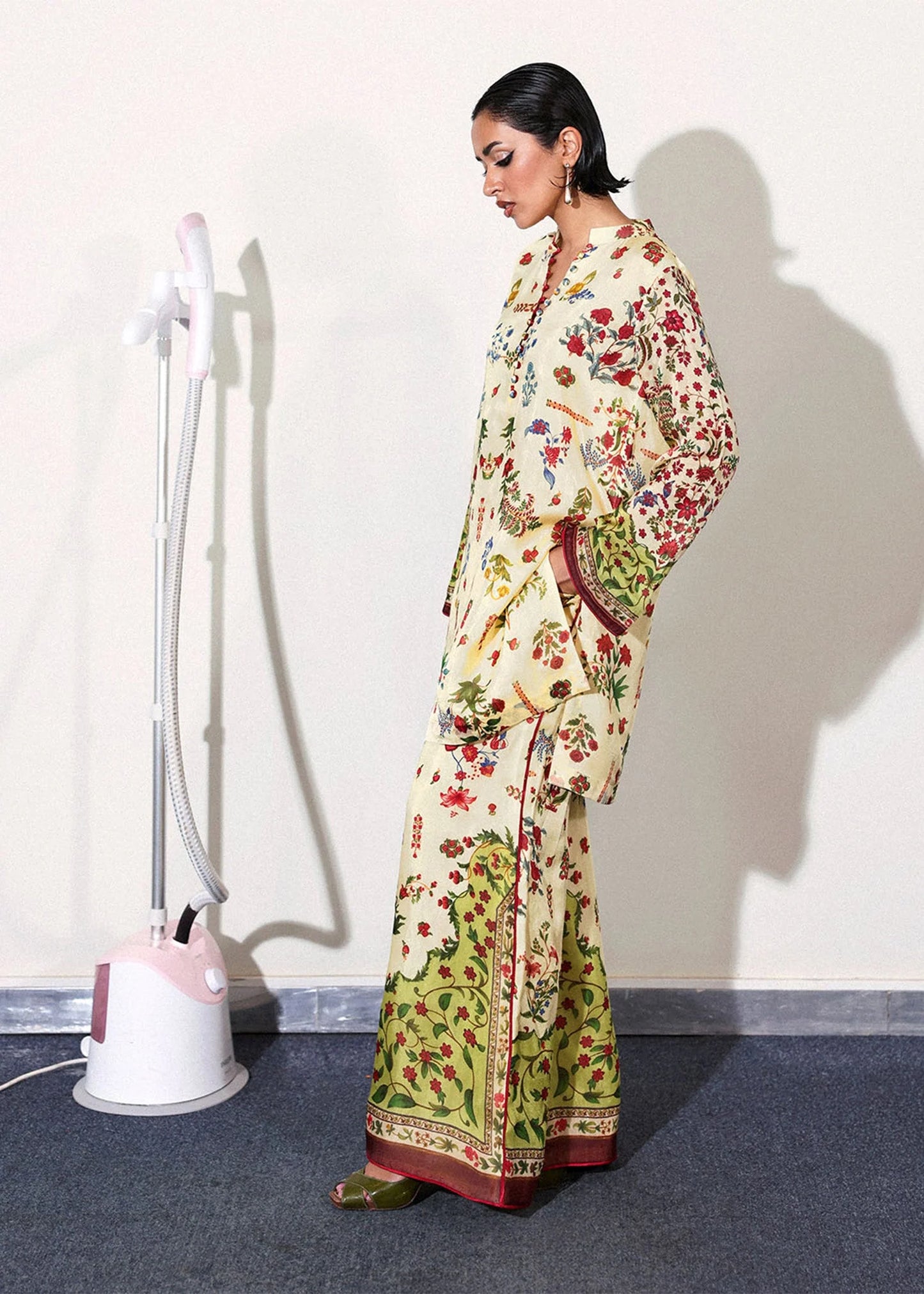 Model wearing cream and multicolor floral Alouette outfit from Hussain Rehar, perfect for Pakistani luxury pret and clothes online in UK.
