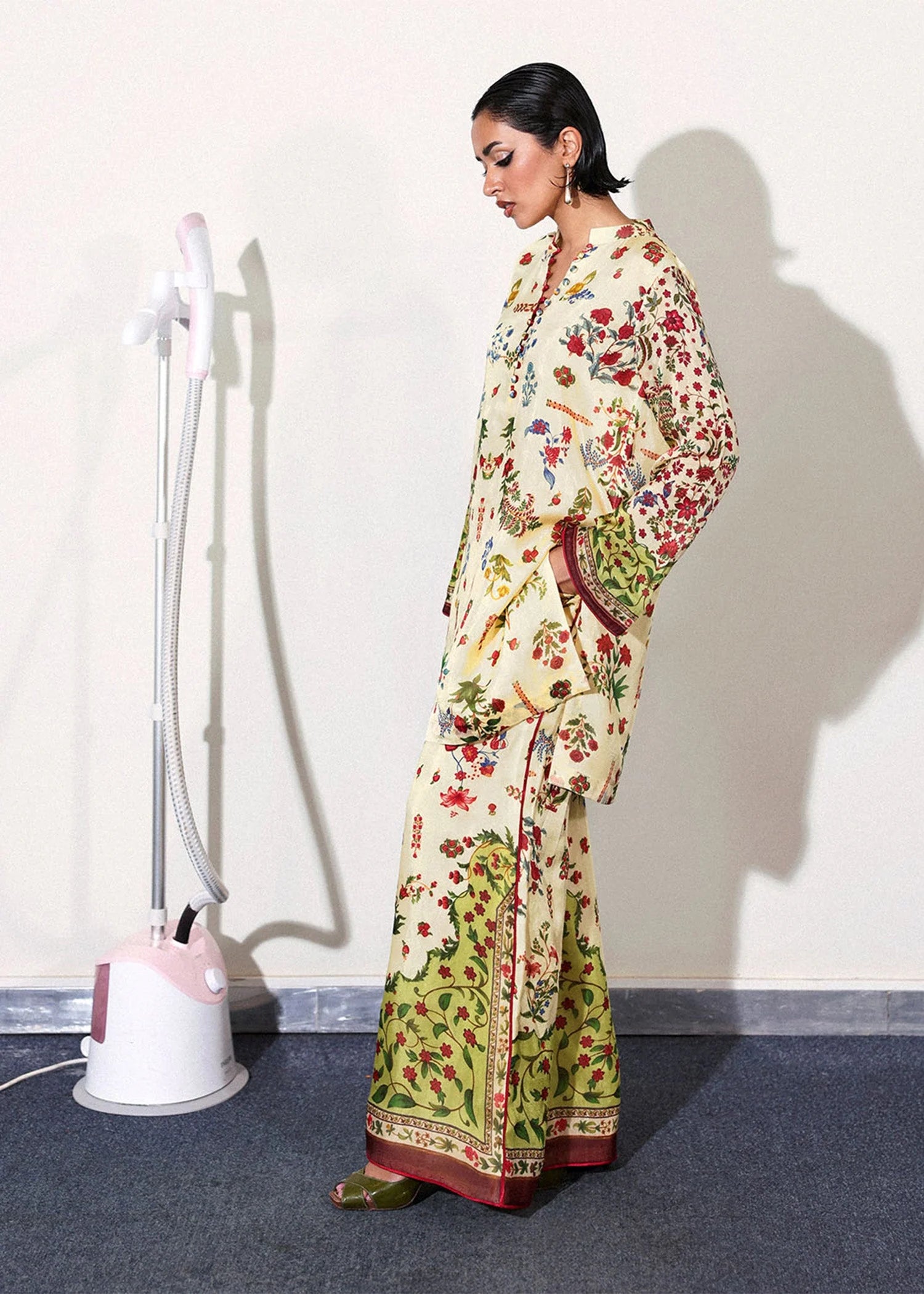 Model wearing cream and multicolor floral Alouette outfit from Hussain Rehar, perfect for Pakistani luxury pret and clothes online in UK.
