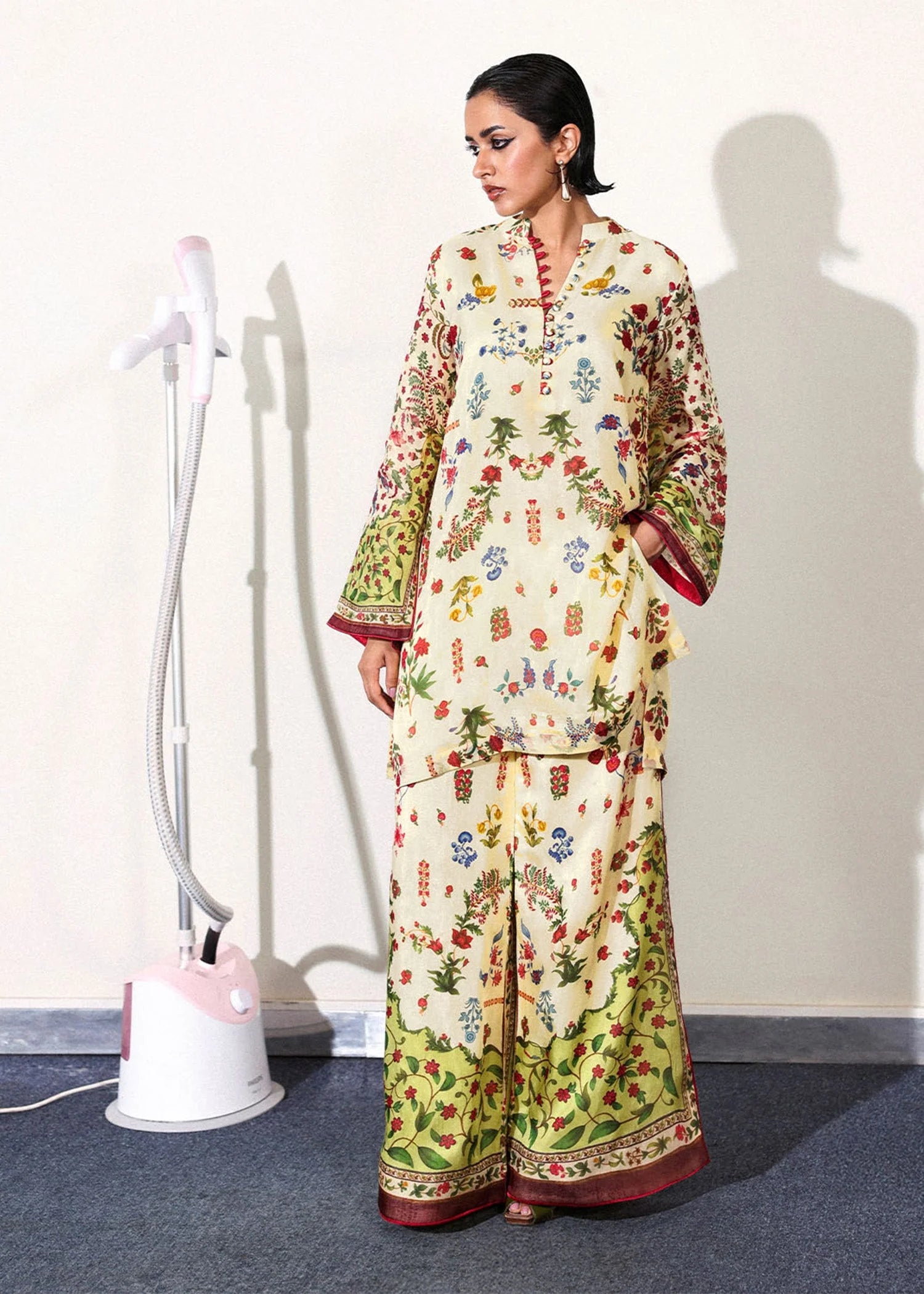Model wearing cream and multicolor floral Alouette outfit from Hussain Rehar, perfect for Pakistani luxury pret and clothes online in UK.