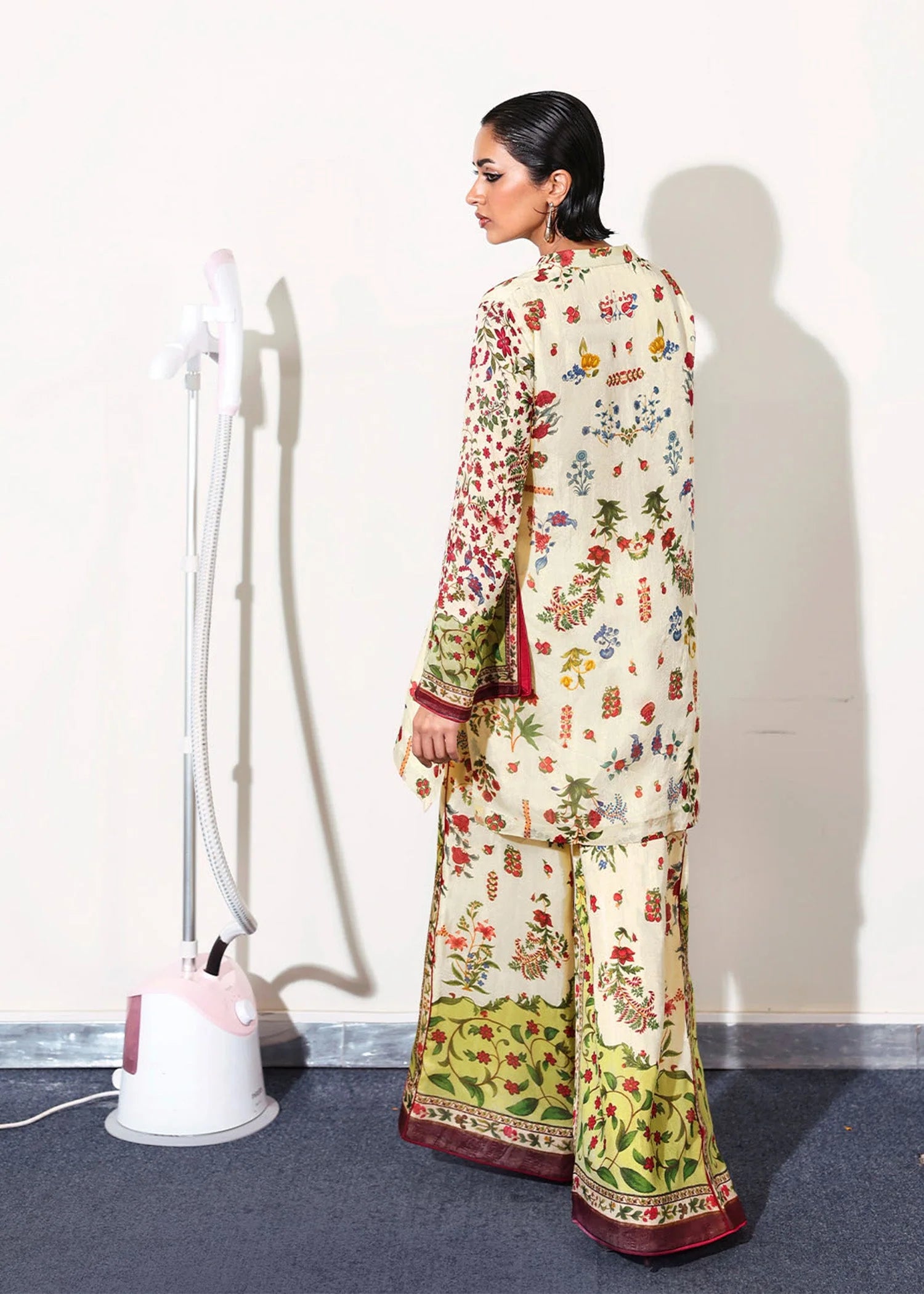 Model wearing cream and multicolor floral Alouette outfit from Hussain Rehar, perfect for Pakistani luxury pret and clothes online in UK.