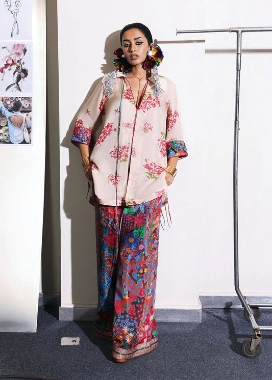 Model wearing blush pink and multicolor floral outfit from Hussain Rehar, perfect for Pakistani luxury pret and clothes online in UK.