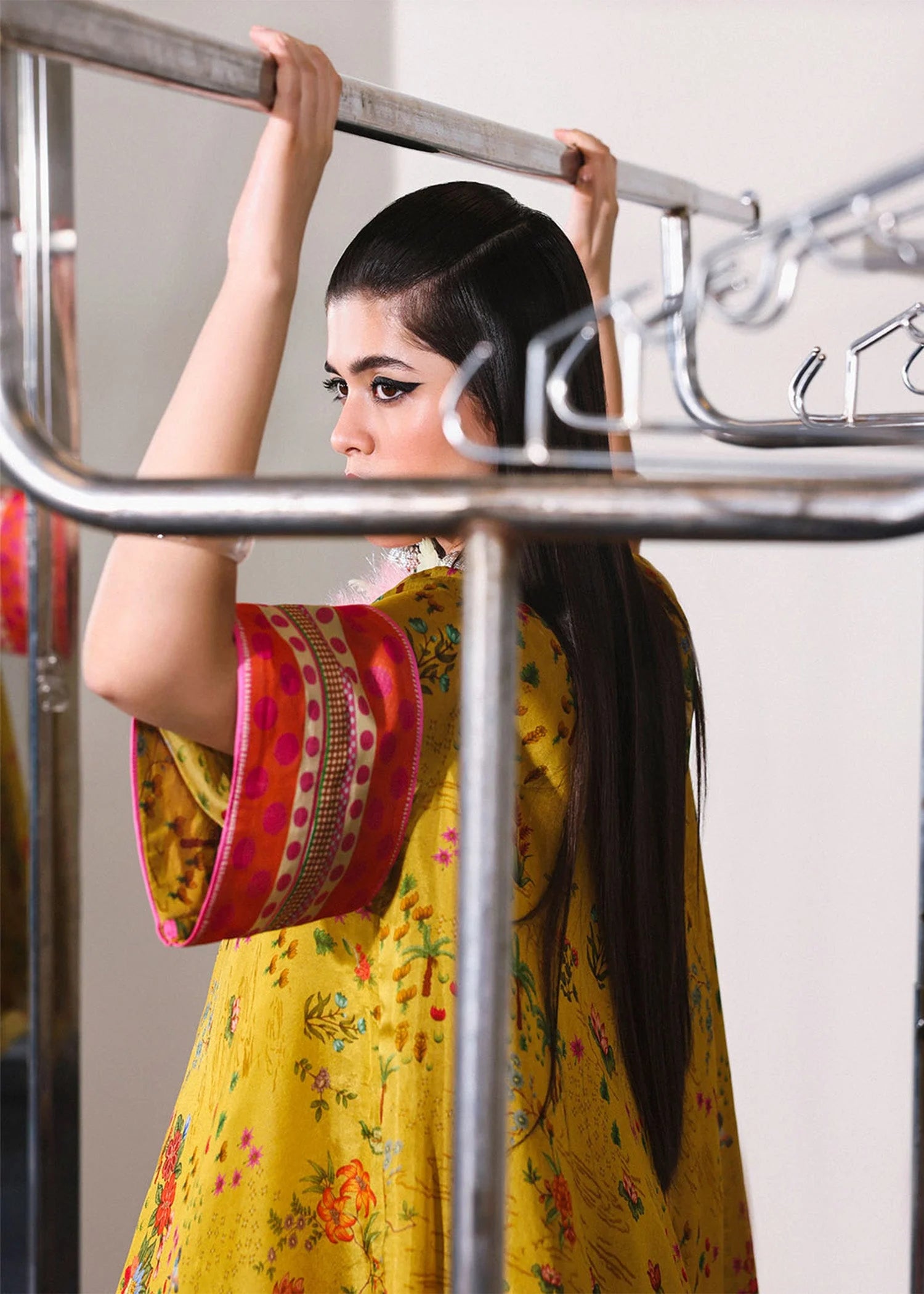 Model wearing mustard yellow and multicolor Aurora set from Hussain Rehar PAY DAY VOL - V, perfect Pakistani luxury pret in the UK.