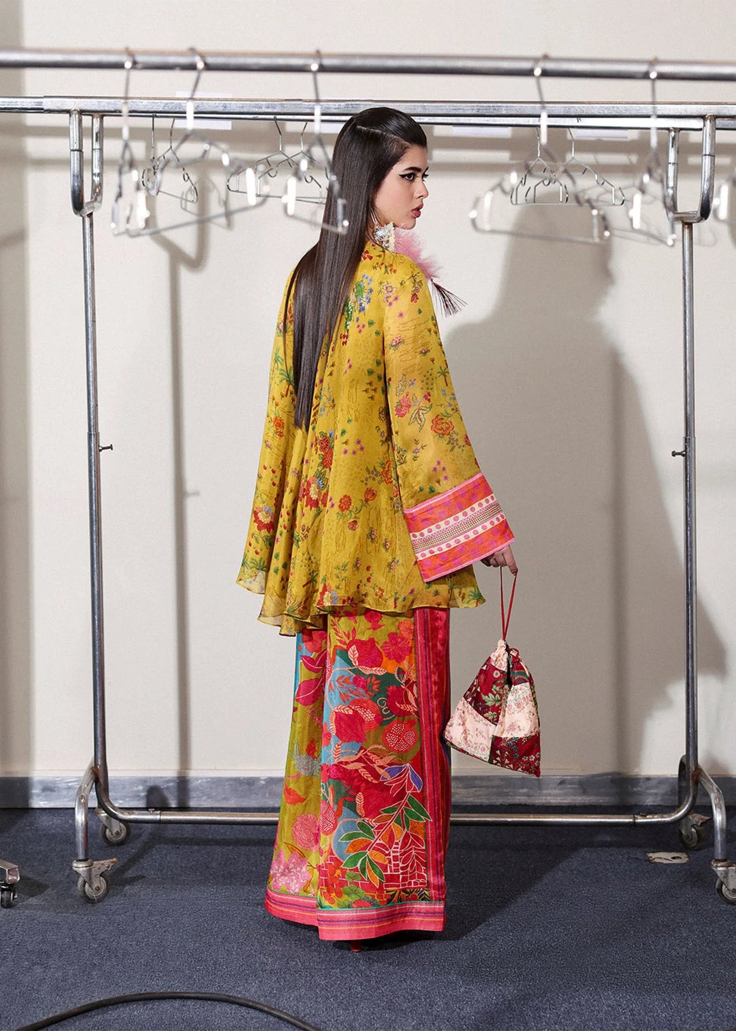 Model wearing mustard yellow and multicolor Aurora set from Hussain Rehar PAY DAY VOL - V, perfect Pakistani luxury pret in the UK.